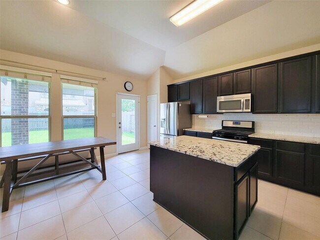Building Photo - "Charming 3-Bed, 2-Bath Retreat in Humble, TX – Your Perfect Home Awaits on Justin Ridge Ln!"