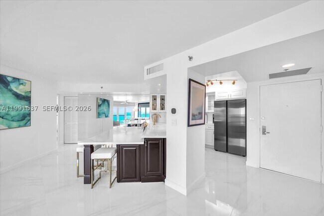Building Photo - 6767 Collins Ave