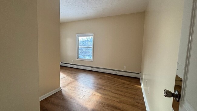 Building Photo - 4 Bedrooms 1.5 Bath Apartment with Heat and Hot Water Included!