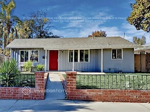 Building Photo - 7359 Louise Ave