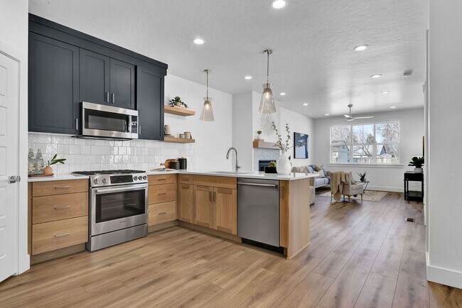 Building Photo - Modern Comfort & Rustic Charm in Prime Boi...
