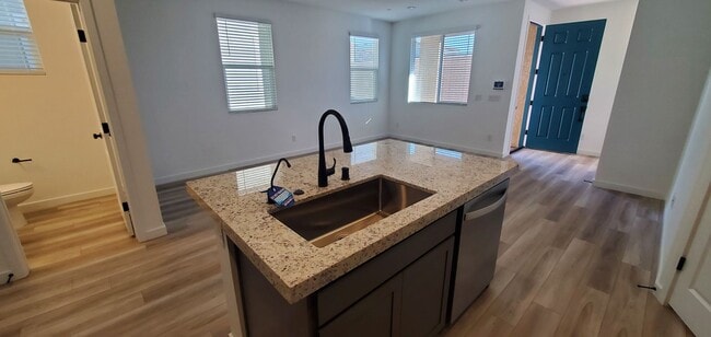 Building Photo - Beautifully designed modern townhome with attached garage.