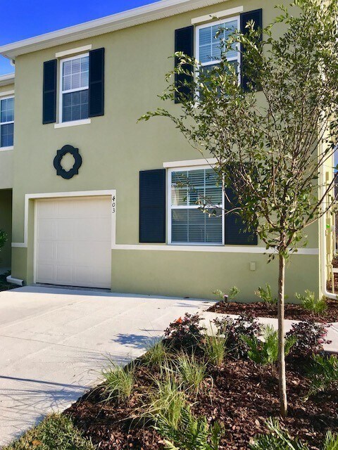 Building Photo - Built in 2018, this 3/2.5 Townhome with a ...