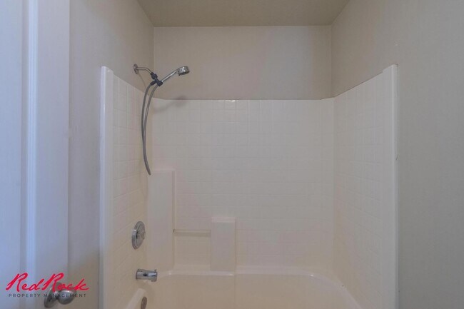 Building Photo - Fresh Carpet! Spacious 5-Bedroom Townhome