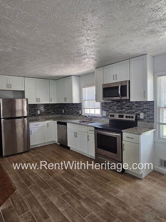 Building Photo - WOW! FANTASTIC RANCH TOTALLY UPDATED - LIKE BRAND NEW WITH ALL THE UPGRADES / ATTENTION TO DETAIL...