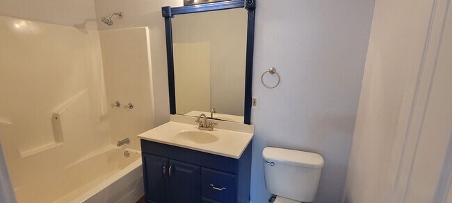 Building Photo - FRESHLY REDONE in 2023 - New floors, fresh...