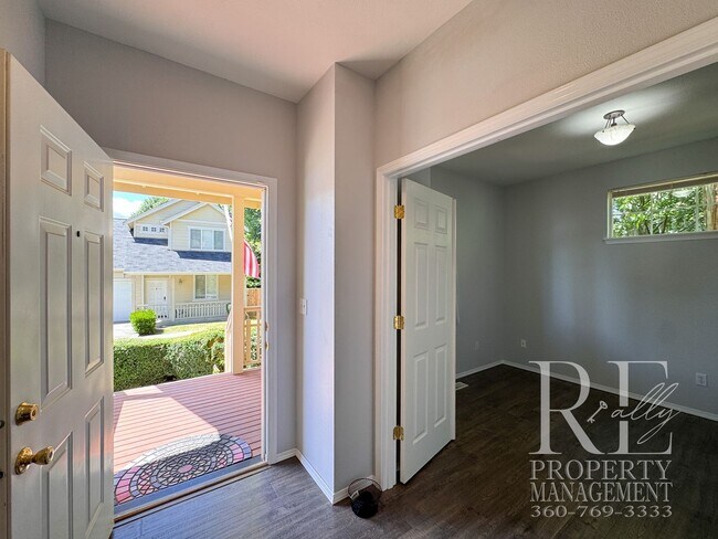 Building Photo - Dual Primary Suites, Huge Backyard Deck & Sun-Filled Living Spaces Near Everyday Conveniences