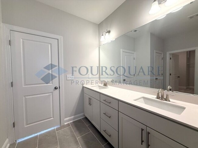 Building Photo - Spacious Corner-Lot Home with Guest Suite, Screened Porch & Detached 2-Car Garage – Resort-Style ...