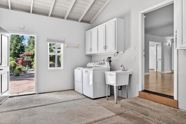 Building Photo - 2,003 Sq Ft Modern 4BR/2BA: Solar, EV Charging & Private Orchard!