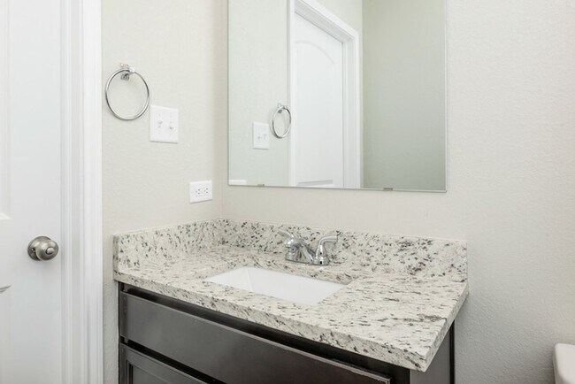 Building Photo - Live, love, and grow in this charming townhome!