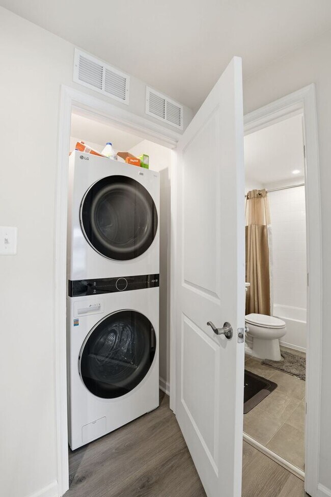 Building Photo - Step into a beautifully designed contemporary residence that exudes style and comfort at every turn.