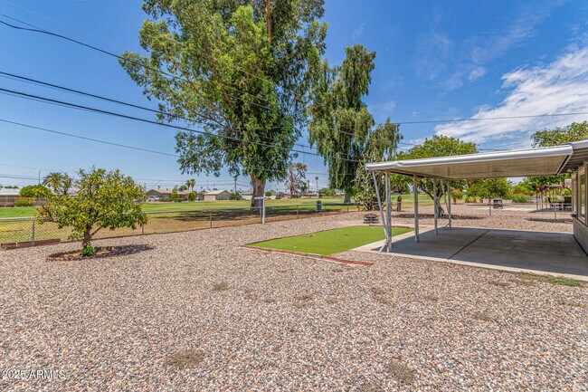 Building Photo - 12640 N Pebble Beach Dr