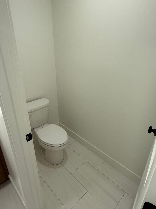 Building Photo - Half off first months rent - Beautiful townhome with 2 car garage, Central Air and Master Suite