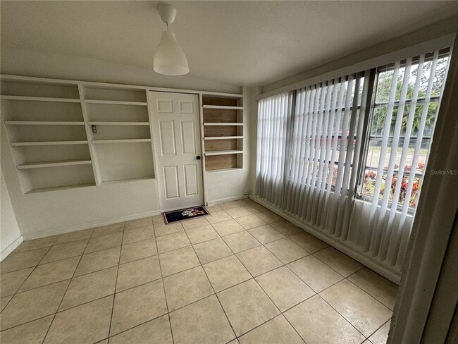 Building Photo - 4680 Royal Palm Ave