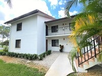 Building Photo - ** REGENCY WOODS ** 3 BED / 2 BATH - CONDO - CARPORT - SOUTH NAPLES - ANNUAL RENTAL