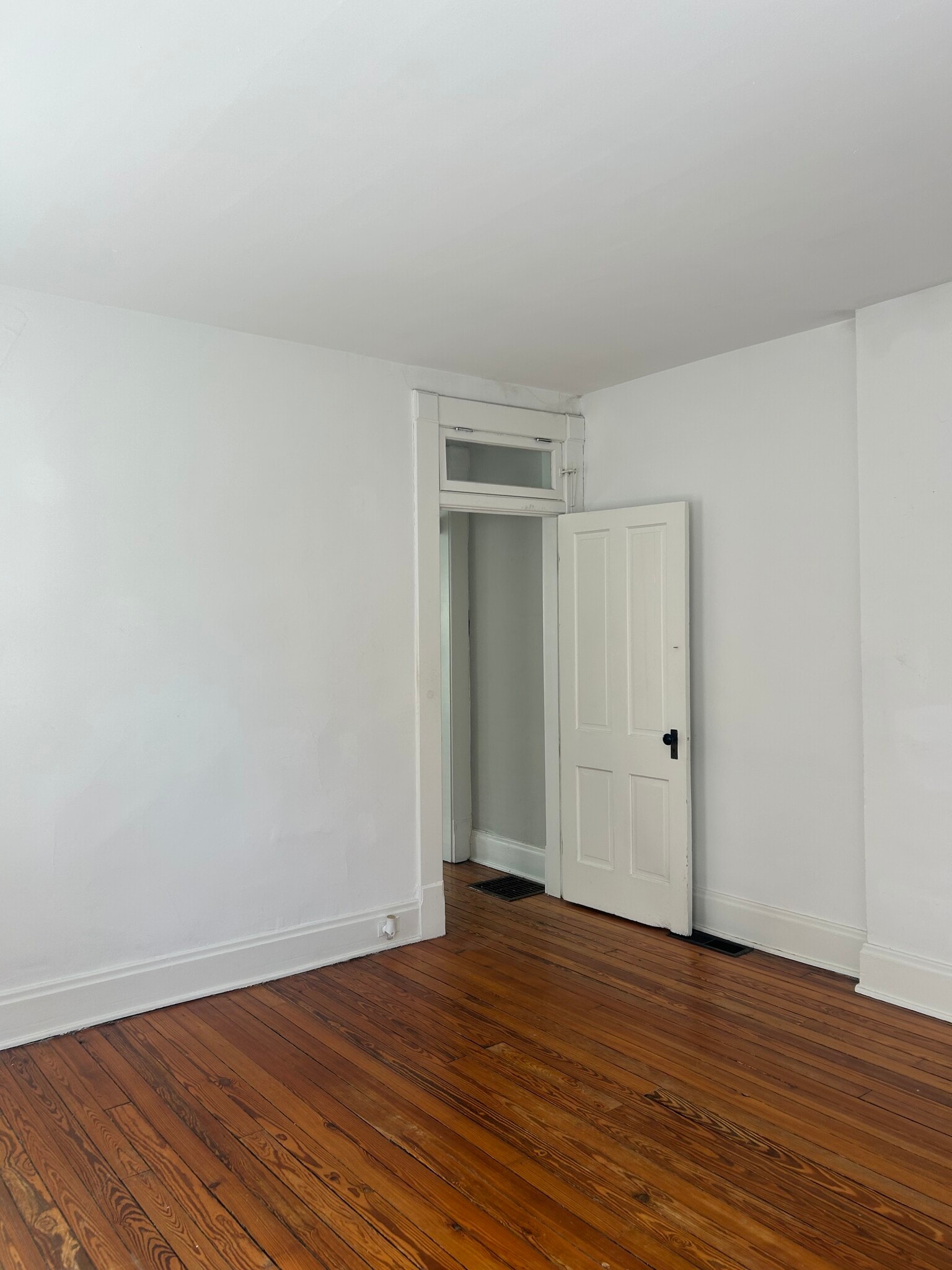 Entrance to bedroom, original restored pine wood floors - 1152 Jaeger St