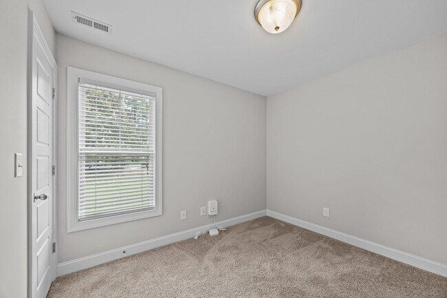 Building Photo - Three-bedroom, two-bathroom home located i...