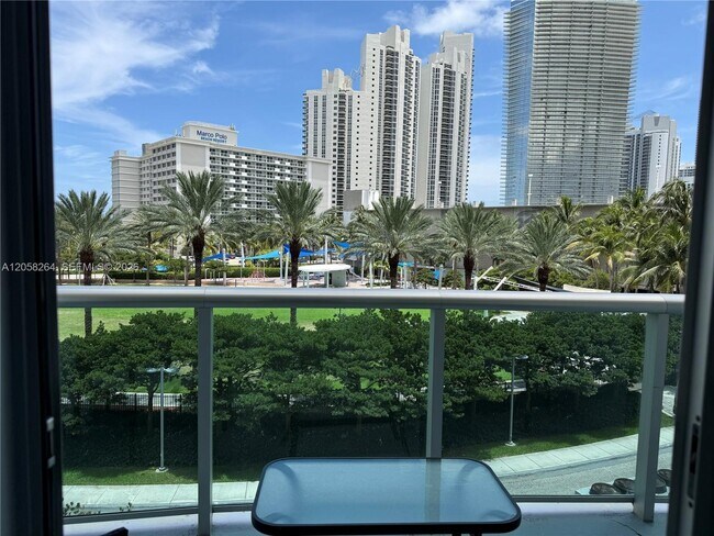 Building Photo - 19370 Collins Ave