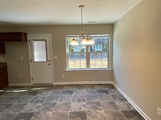 Building Photo - New 3 Bedroom 2 bath with 2 Car Garage Hom...