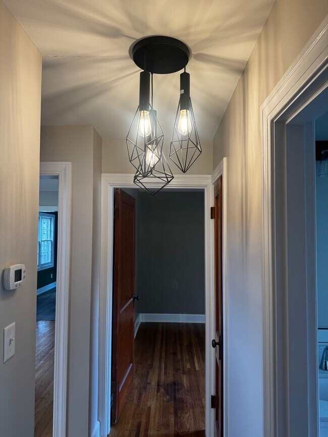 Building Photo - Fully Updated 3BR/2BA St. Matthews Cape Cod with Garage & Wrap-Around Deck