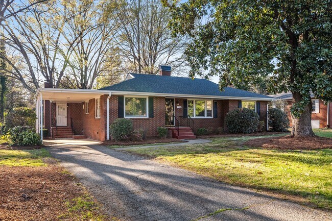 Building Photo - NW - Large Brick Ranch, Updated, Hardwoods, LR, DR, Den, Two Decorative Fire Places, Fenced, Stor...