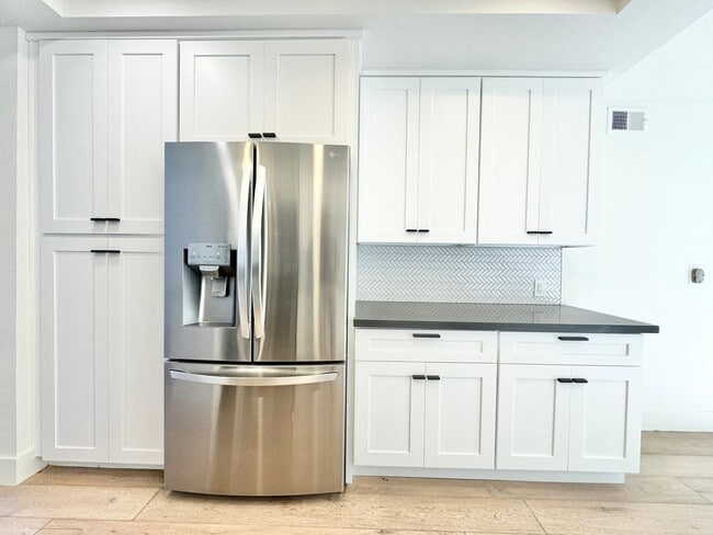 Building Photo - Stunning 3BD Home in Costa Mesa — 2 Car Attached Garage, Pool, Tennis Court & Modern Upgrades