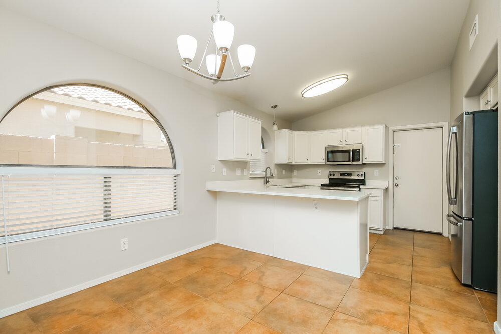 Building Photo - 9909 E Onza Ave