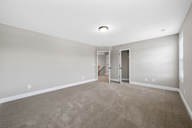 Building Photo - Beautiful 4-Bedroom Home with Modern Comfo...