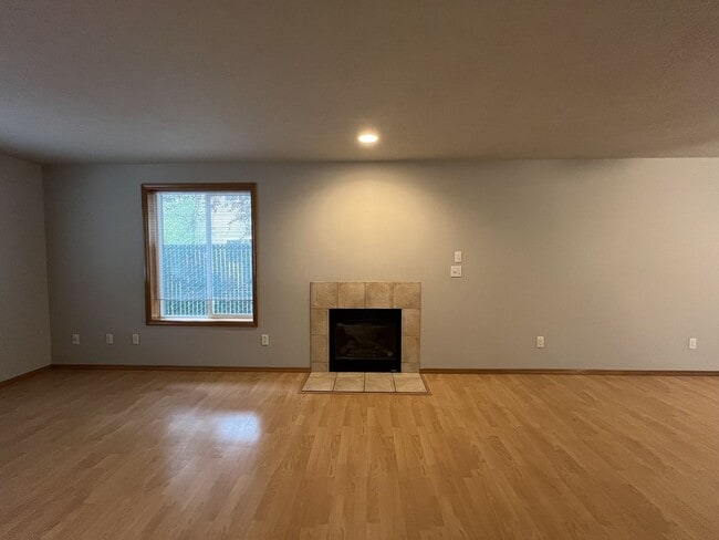 Building Photo - 3-Bed Home with Fireplace, Fenced Backyard, 2 Car Garage & Front Patio!