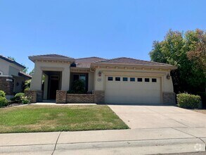 Building Photo - 4 bedroom 2 bath Empire Ranch home