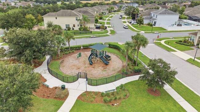 Building Photo - Spacious 6-Bedroom Home Near Lake Nona | 3-Car Garage + Tesla Charger