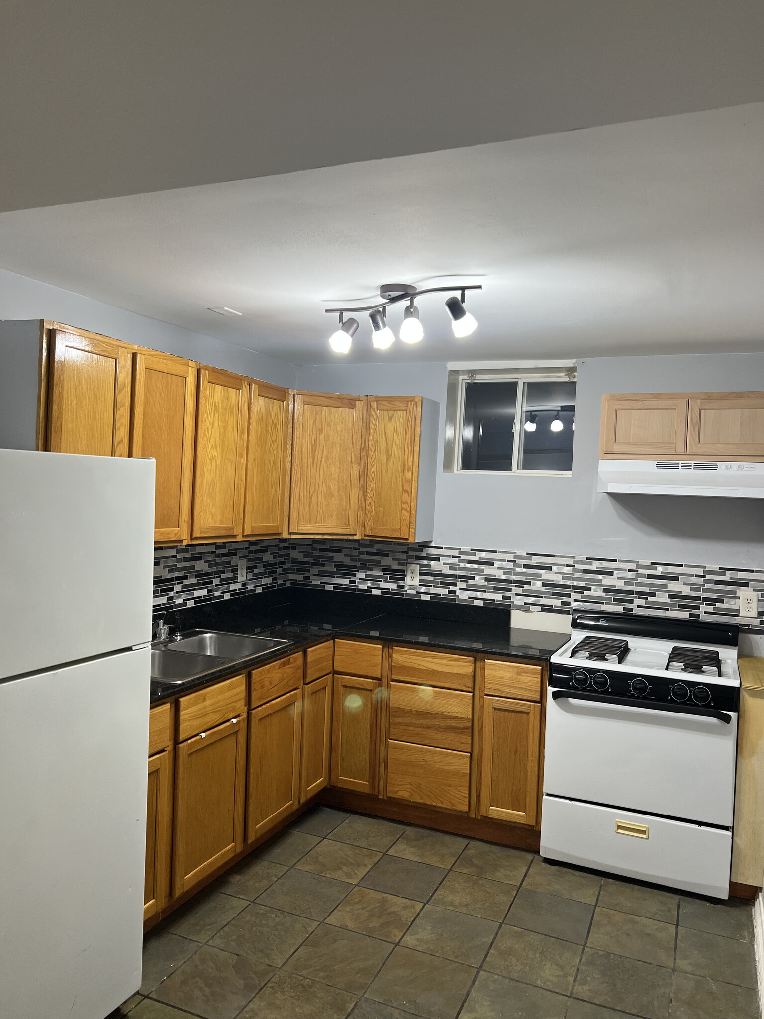 Kitchen downstairs - 618 E 39th Ln