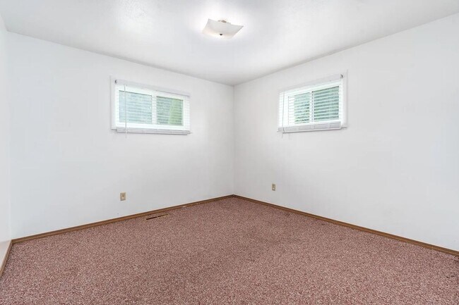 Building Photo - Beautiful 4-Bedroom Home with Finished Bas...