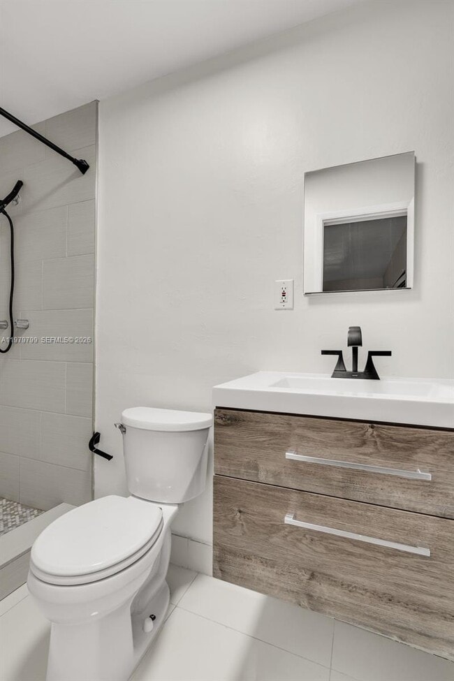 Building Photo - 5655 NE 5th Terrace