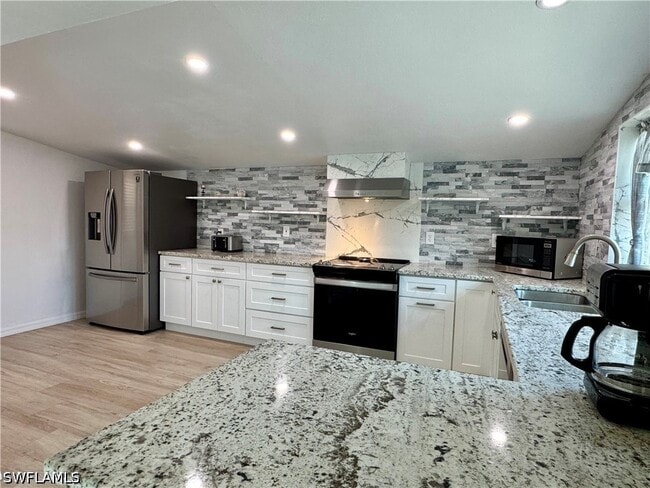 Building Photo - 829 107th Ave N