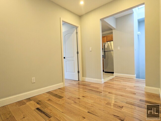Building Photo - Beautiful Renovated Jackson Heights apartment
