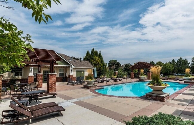 Building Photo - Stunning 3-bed 3-bath townhome that features hardwood floors and an attached 2-car garage!