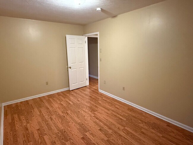 Building Photo - Updated 4BR Home with Finished Basement & Level Yard