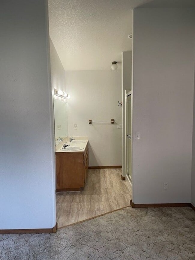 Building Photo - Spacious 3 Bed 3 Bath Townhome with Finished Basement & 2-Car Garage