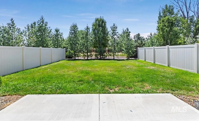 Building Photo - Stunning 4-Bedroom Home with Privacy & Low-Maintenance Living in Verado