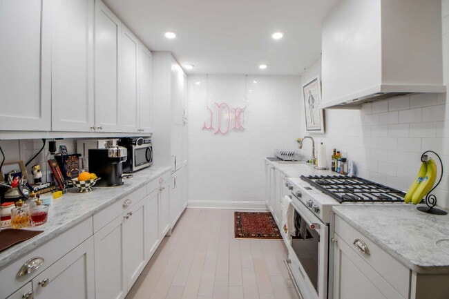 Building Photo - Affordable (utils included!) Luxury Living...