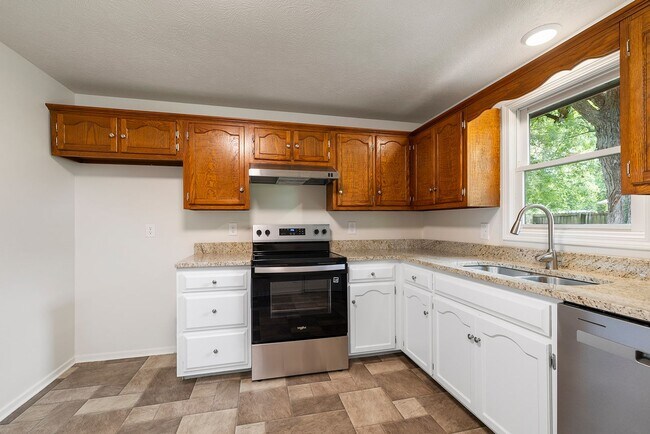 Building Photo - Charming Updated Home with 1-Car Garage, Fenced Backyard & Modern Finishes