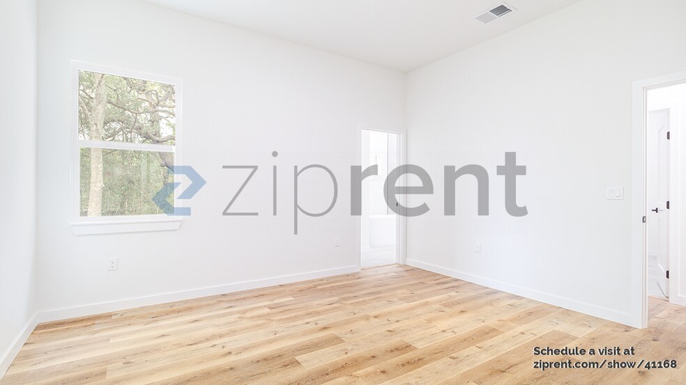 Building Photo - 8202 N Triana Dr
