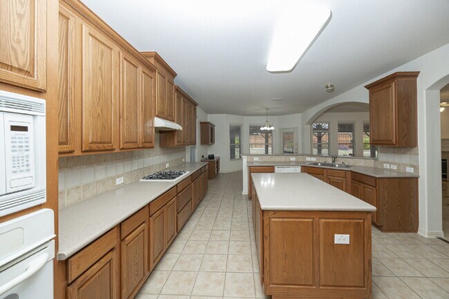 Building Photo - Spacious 4-Bedroom Home with Large Backyard in Rowlett