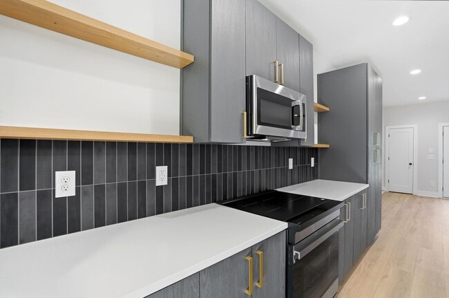 Building Photo - Bishop at Briar Creek, an end-unit townhome