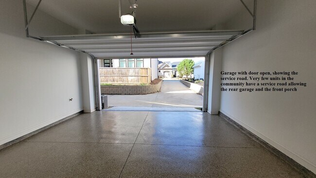 Building Photo - End-unit townhome with plenty of extra windows! Gated Community.