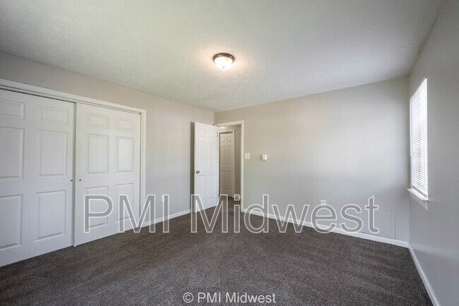 Building Photo - 6260 E 11th St