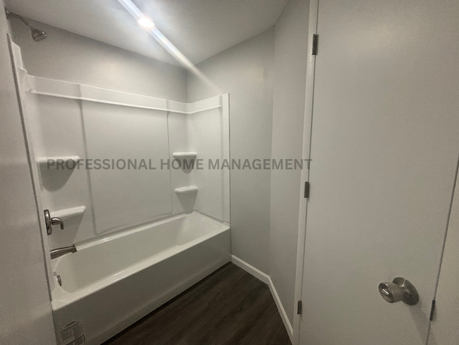 Building Photo - Welcome to your beautifully renovated 4-be...