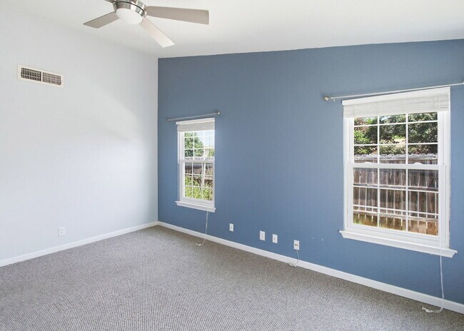 Building Photo - Corner-Lot Garden Home with a Private Patio.
