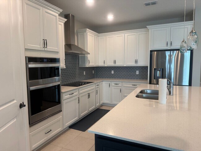 Building Photo - Lakeview Living with Bonus Flex Space & Resort-Style Amenities